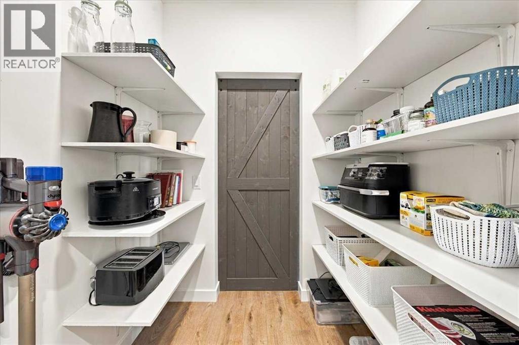 The former "media nook" has been transformed into a secondary pantry area. A BRILLIANT use of the space!