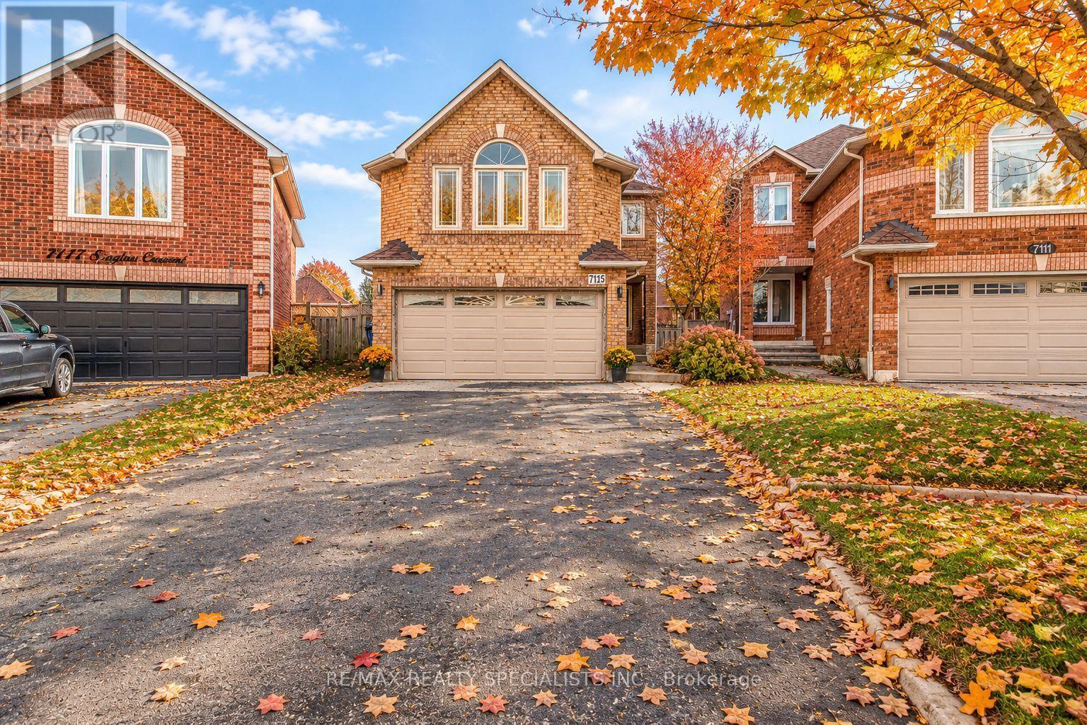 7115 SPYGLASS CRESCENT