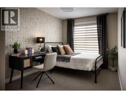 Bedroom - 128 Belmont Place Sw, Calgary, AB T2X0T9 Photo 10