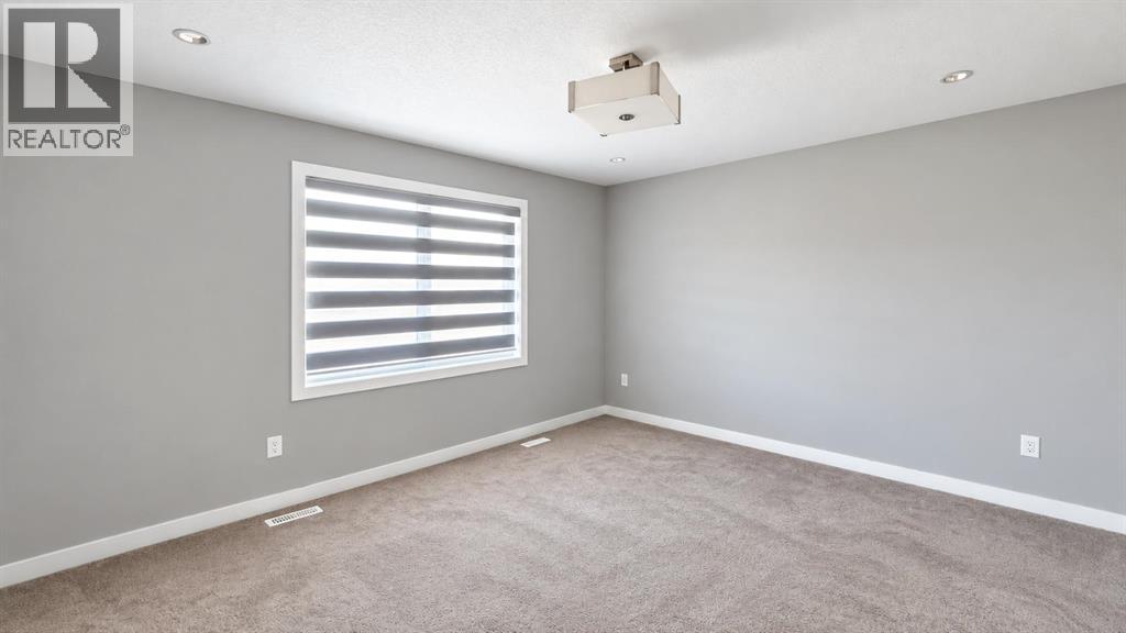 197 Baysprings Gardens SW, Airdrie — photo 16