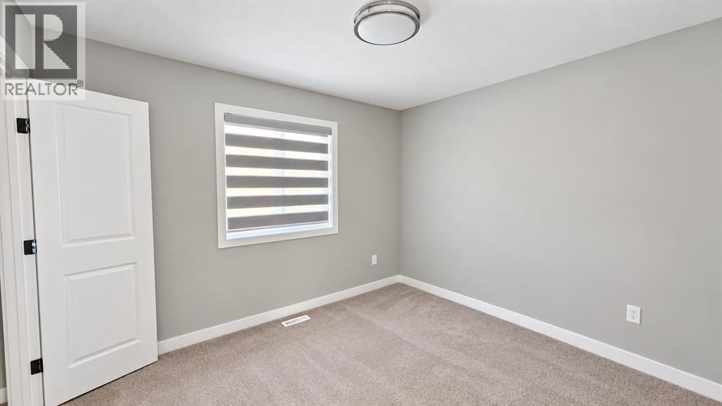 197 Baysprings Gardens SW, Airdrie — photo 22
