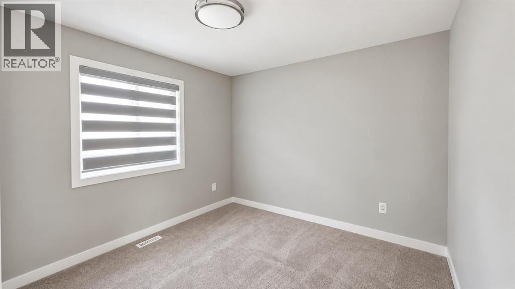 197 Baysprings Gardens SW, Airdrie — photo 23