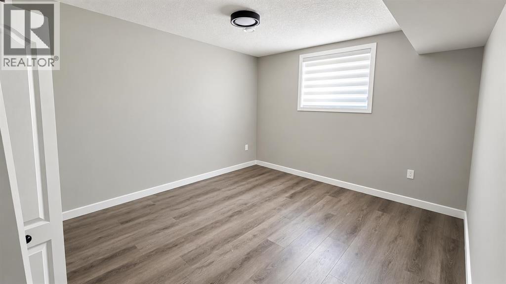 197 Baysprings Gardens SW, Airdrie — photo 35