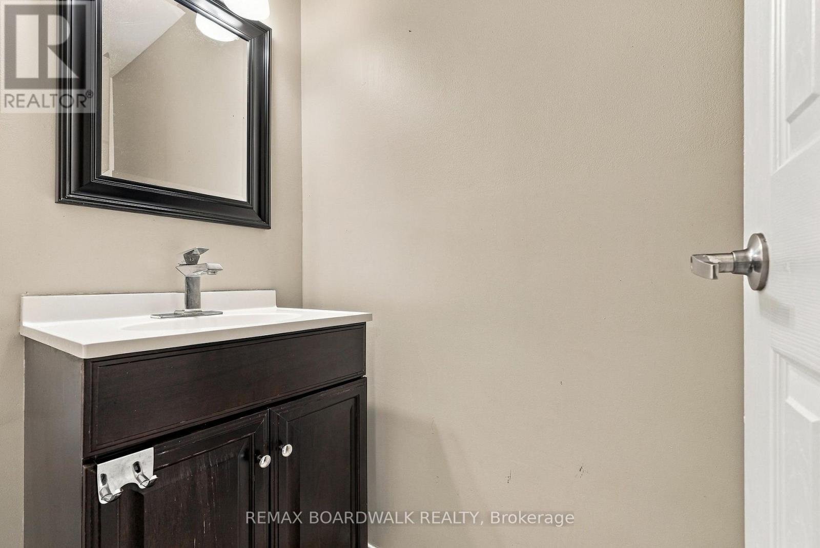 Powder room off the main hall