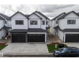 Laundry room - #64 5122 213a St Nw, Edmonton, AB T6M1M6 Photo 8