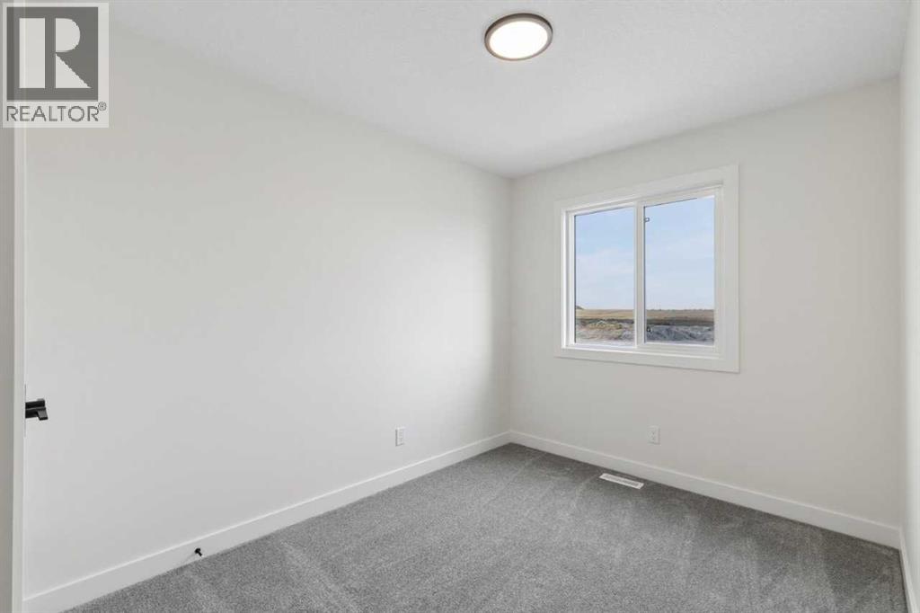 174 Lanark Gate SE, Airdrie — photo 15