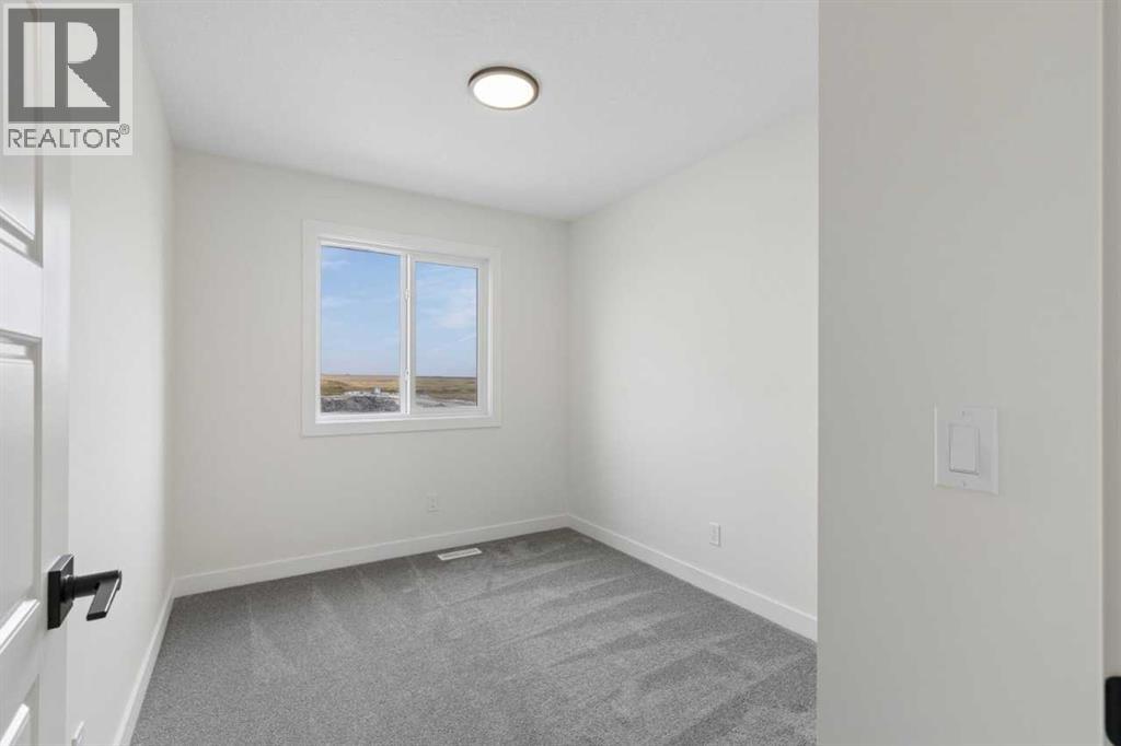 174 Lanark Gate SE, Airdrie — photo 16