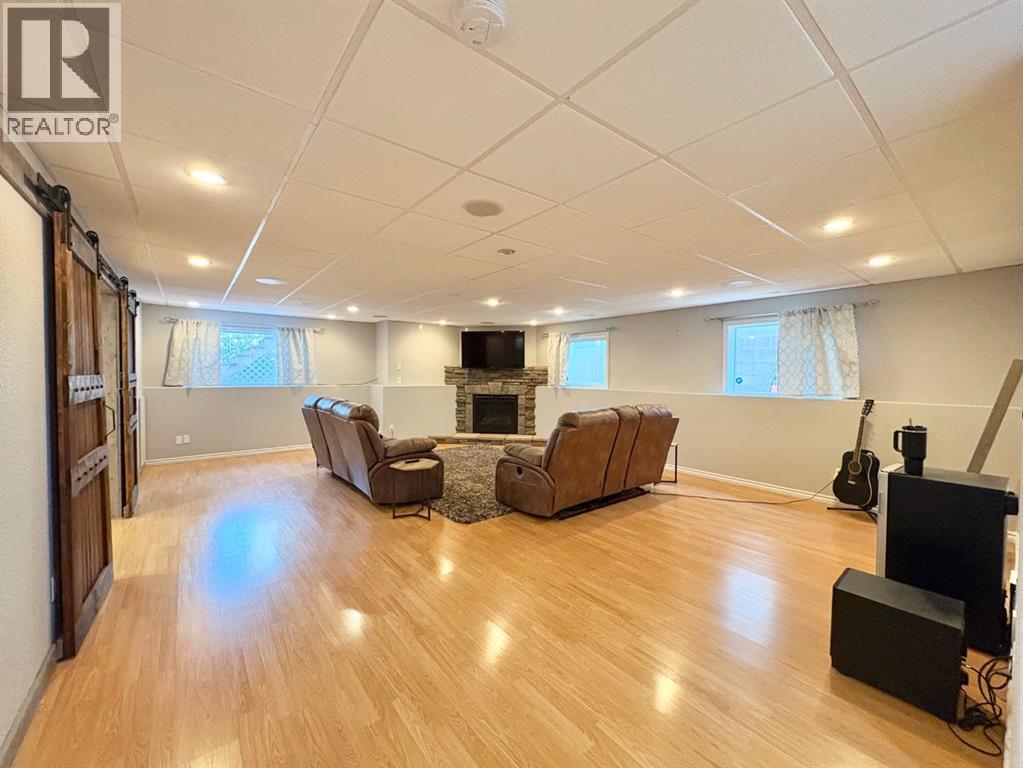 Enormous family room with fireplace