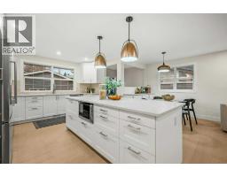 Laundry room - 7 Canna Bay Sw, Calgary, AB T2W1P2 Photo 12