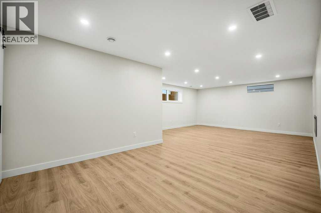 7 Canna Bay SW, Calgary — photo 22