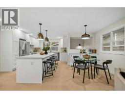 Kitchen - 7 Canna Bay Sw, Calgary, AB T2W1P2 Photo 6