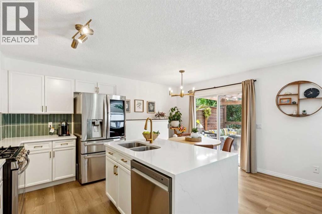 242 Cougar Plateau Mews SW, photo 10 of 42