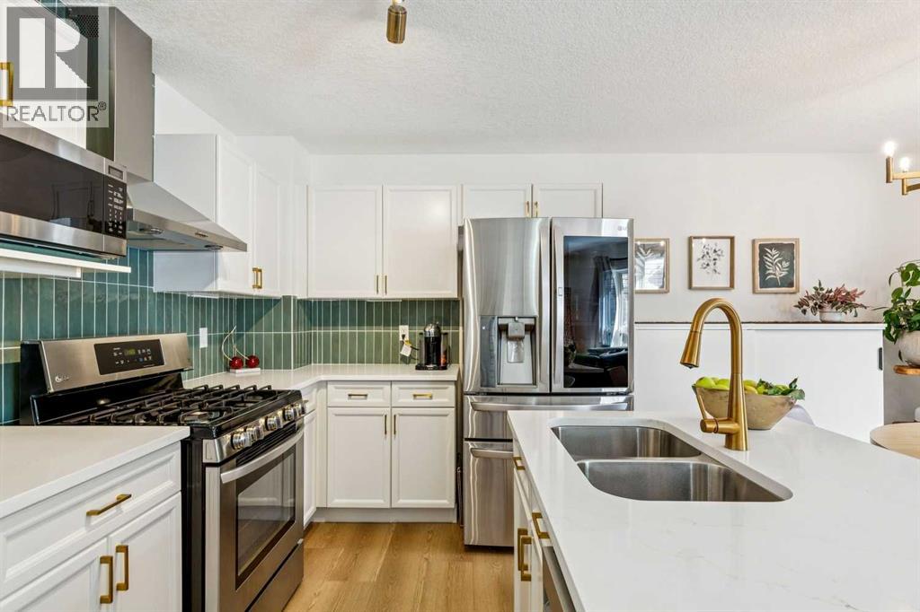 242 Cougar Plateau Mews SW, photo 8 of 42