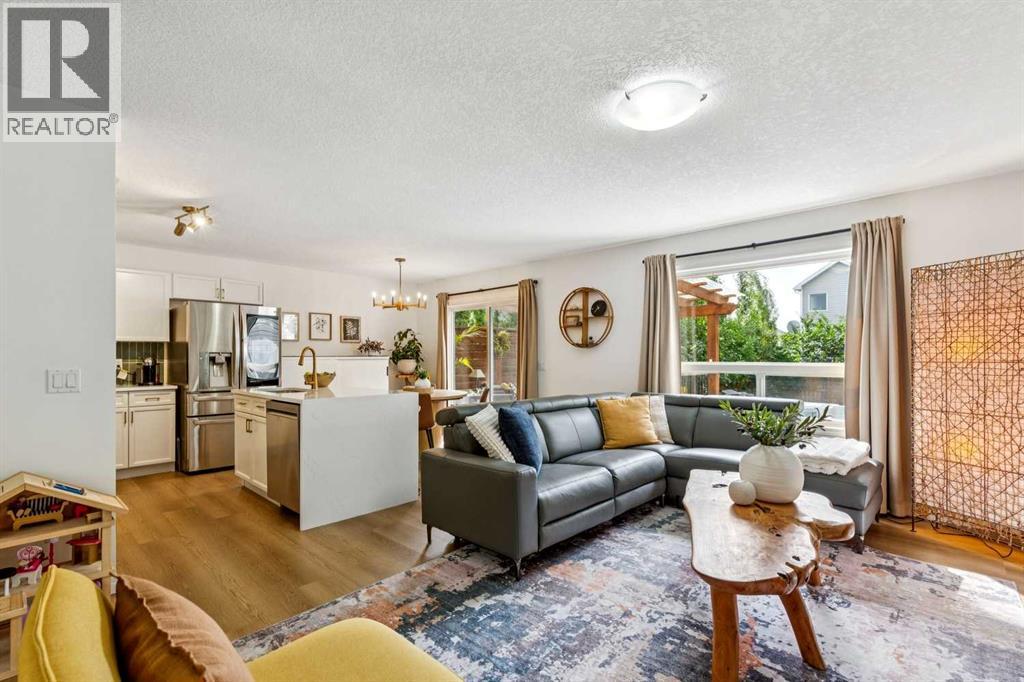 242 Cougar Plateau Mews SW, photo 2 of 42