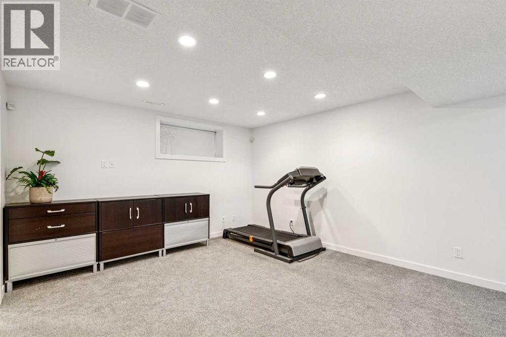242 Cougar Plateau Mews SW, photo 32 of 42
