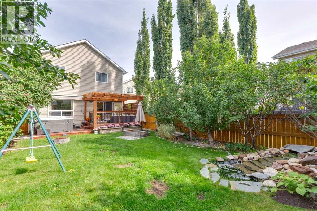 242 Cougar Plateau Mews SW, photo 35 of 42