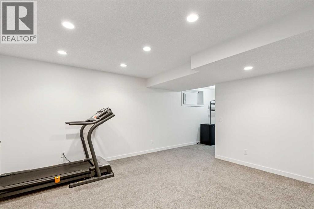 242 Cougar Plateau Mews SW, photo 33 of 42
