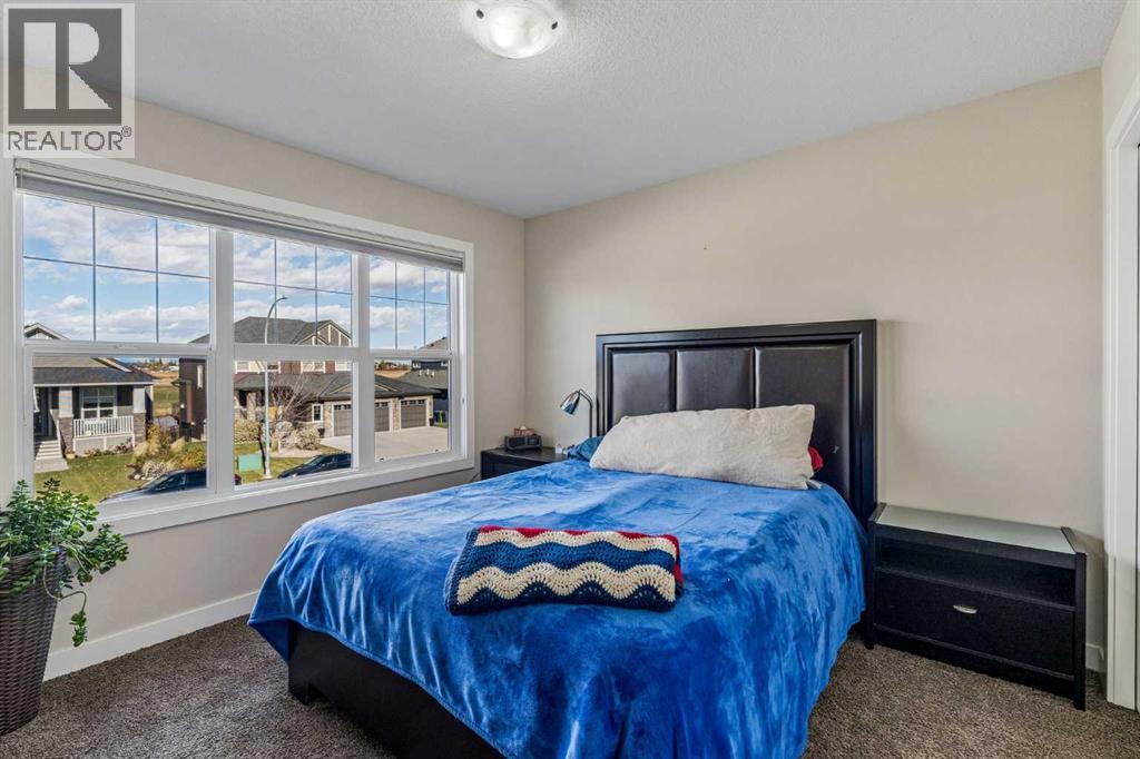 281 Boulder Creek Crescent SE, Langdon — photo 18