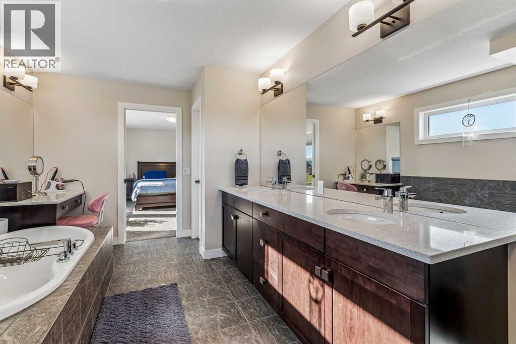 281 Boulder Creek Crescent SE, Langdon — photo 26