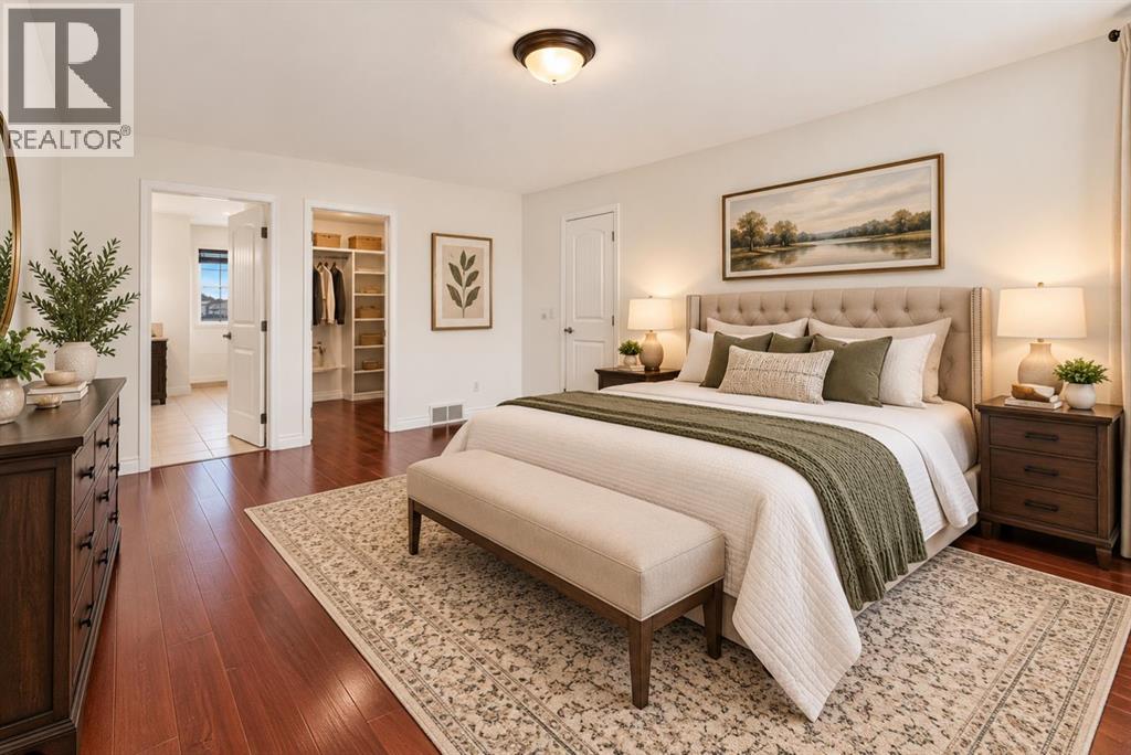 Spacious primary bedroom (This photo has been digitally staged)
