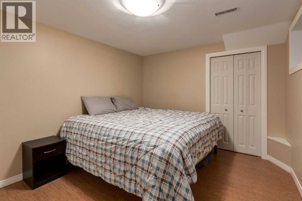 4 ARBOUR CLIFF Court NW, Calgary — photo 35