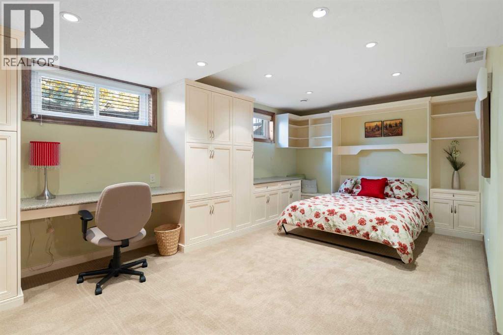 Basement Bedroom with Murphy Bed and Built Ins
