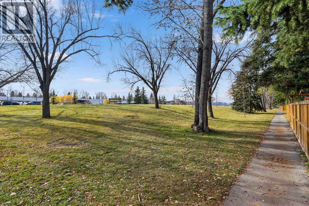Out the Front Entrance is Varsity Park, Leading down to the Bow River