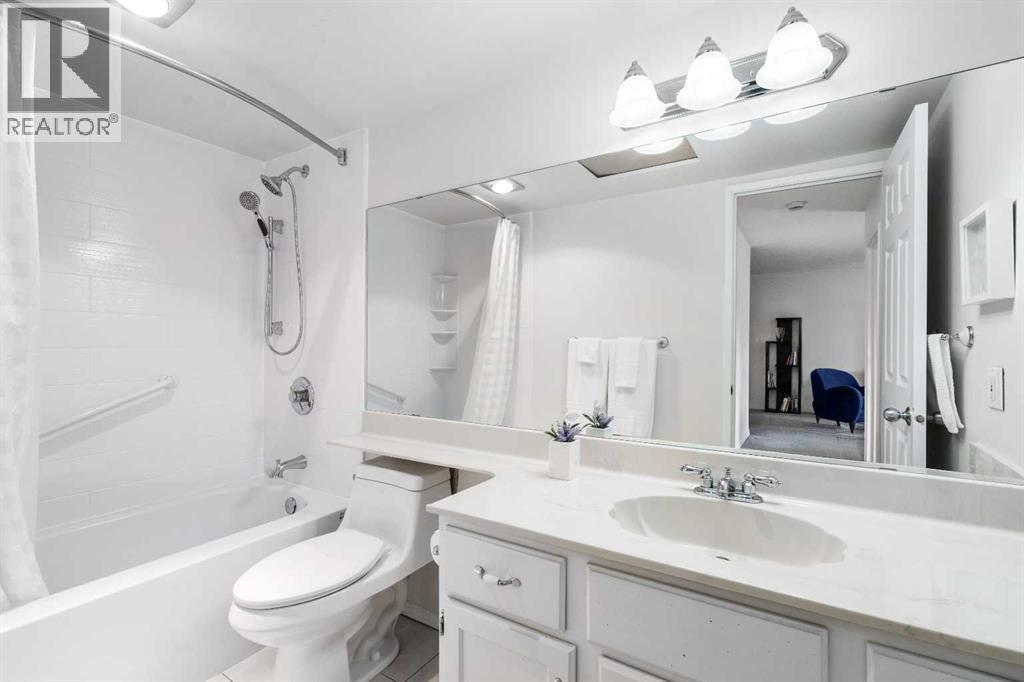 Updated bathtub and faucet fixtures add a fresh touch to the bathroom