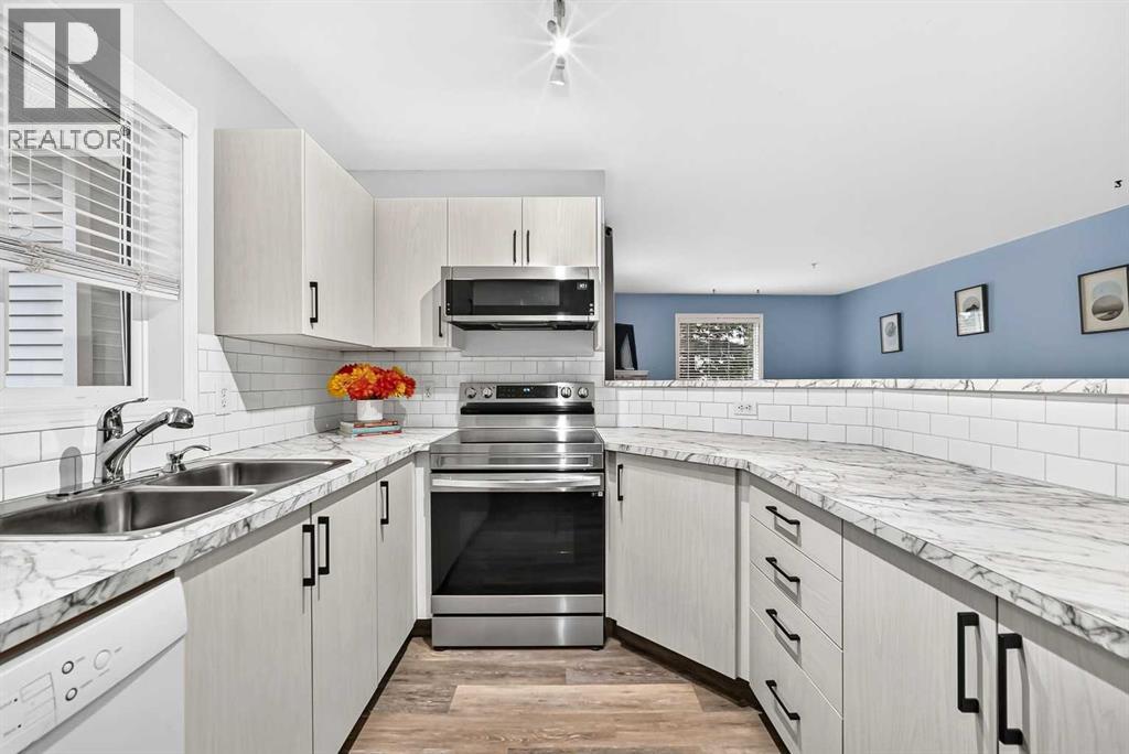 106, 4000 Somervale Court SW, Calgary — photo 4