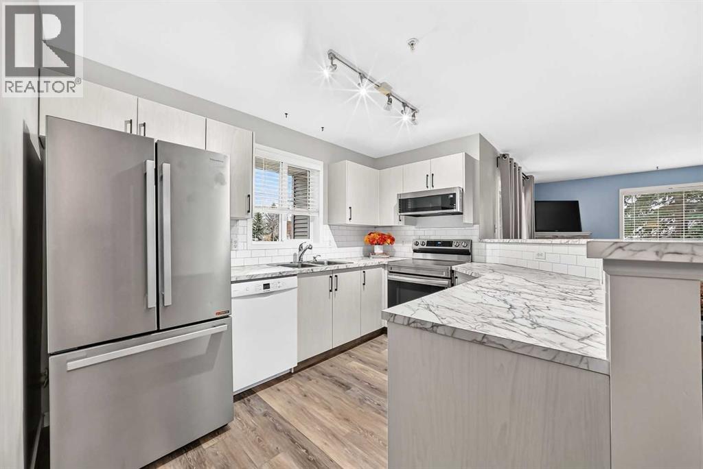 106, 4000 Somervale Court SW, Calgary — photo 5