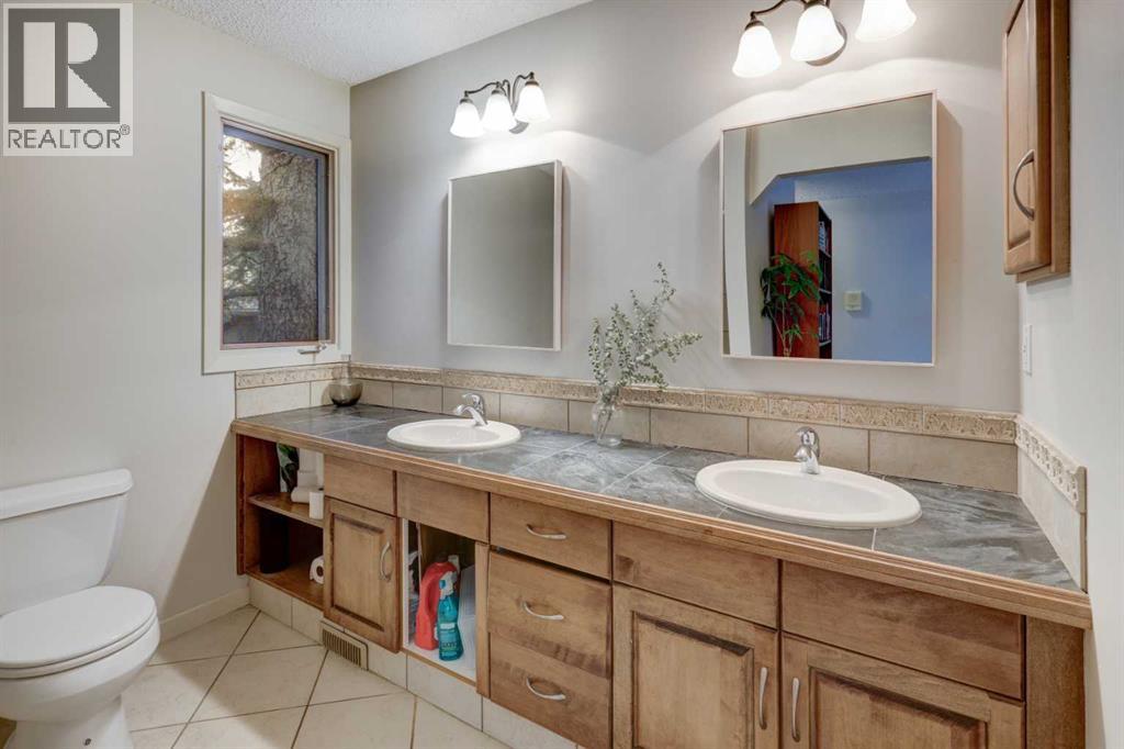 216 Pump Hill Gardens SW, Calgary — photo 19