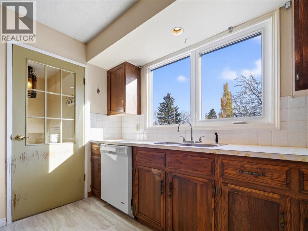 1219 Hunterquay Hill NW, Calgary — photo 19