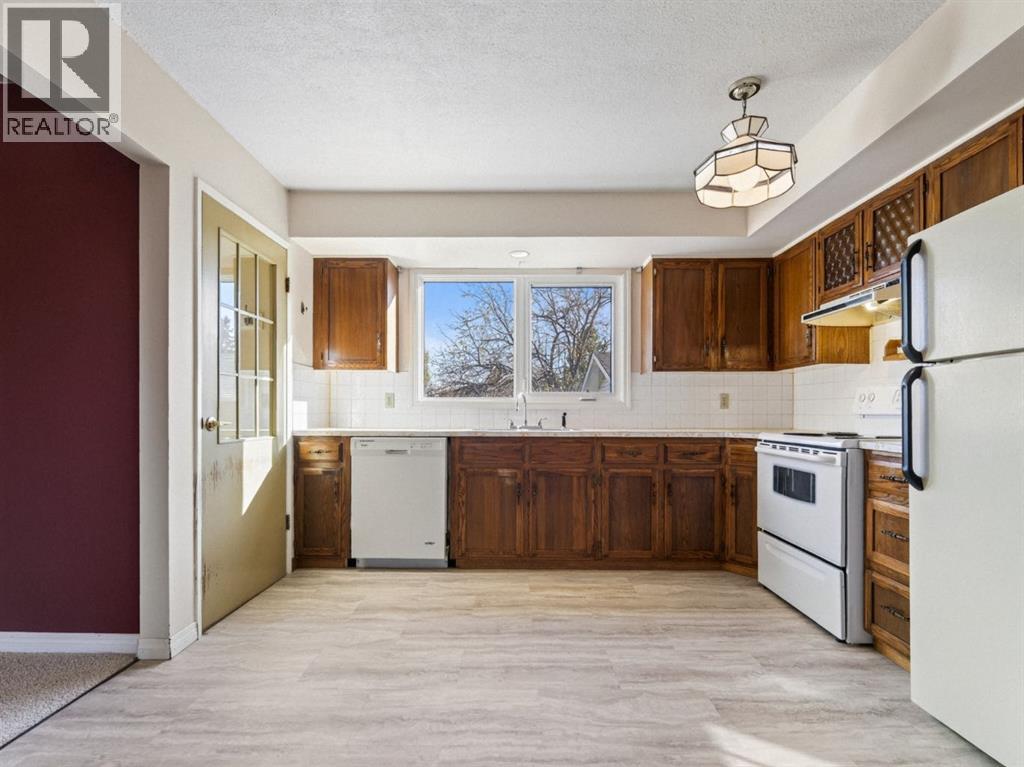 1219 Hunterquay Hill NW, Calgary — photo 15