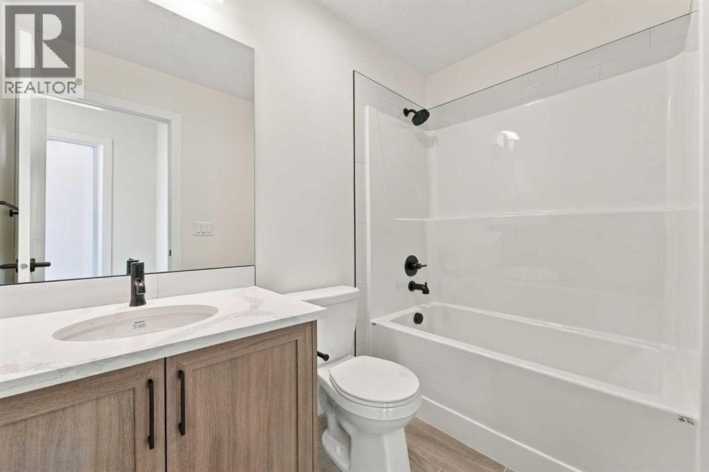 604, 201 Cooperswood Green SW, Airdrie — photo 26