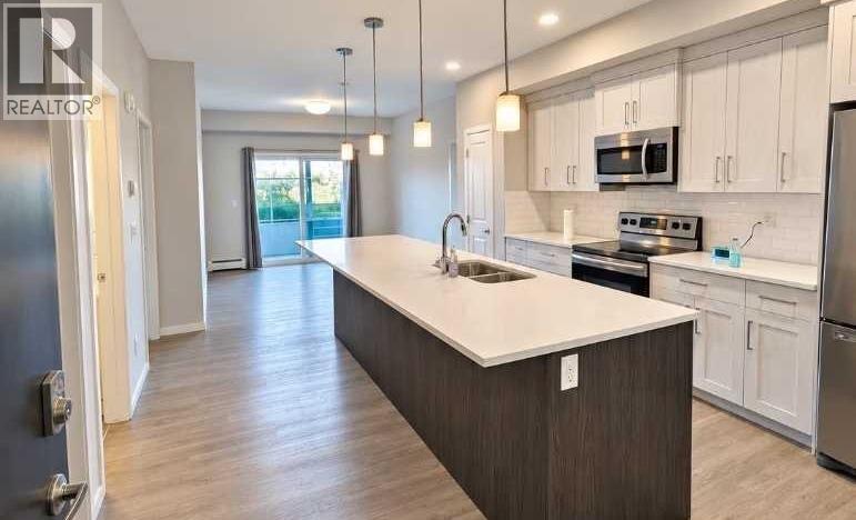 113, 4150 Seton Drive SE, Calgary — photo 2