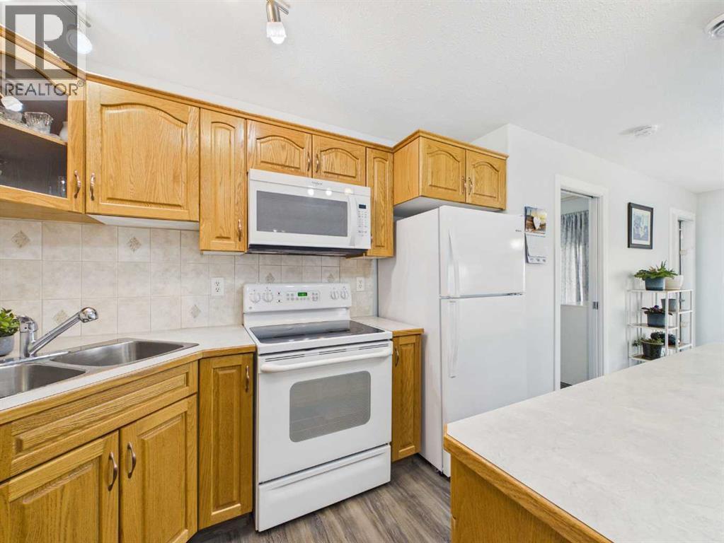 Listing photo – 411, 4425 Heritage Way, Lacombe