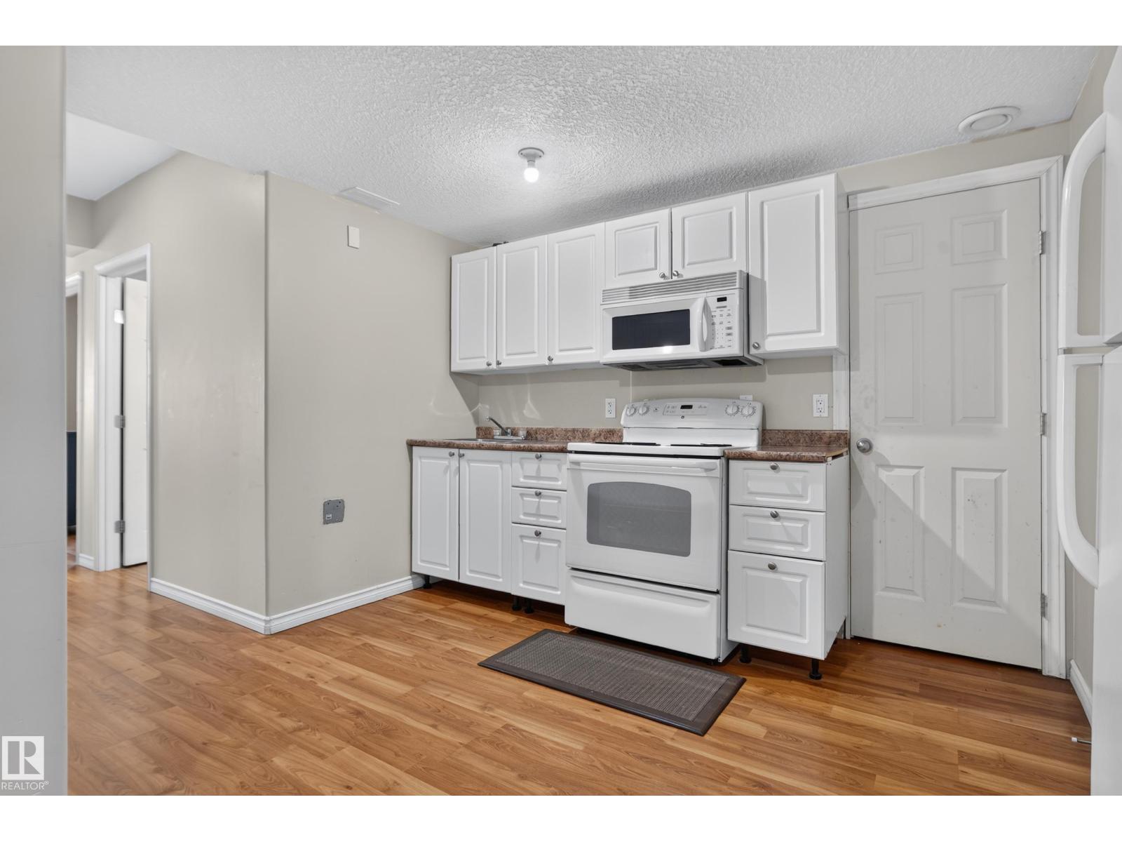 719 WILDWOOD PT NW photo 51