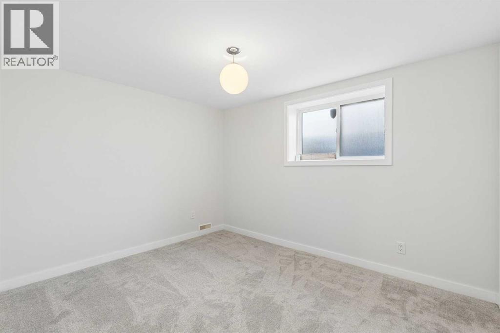 31 Hoover Place SW, Calgary — photo 24