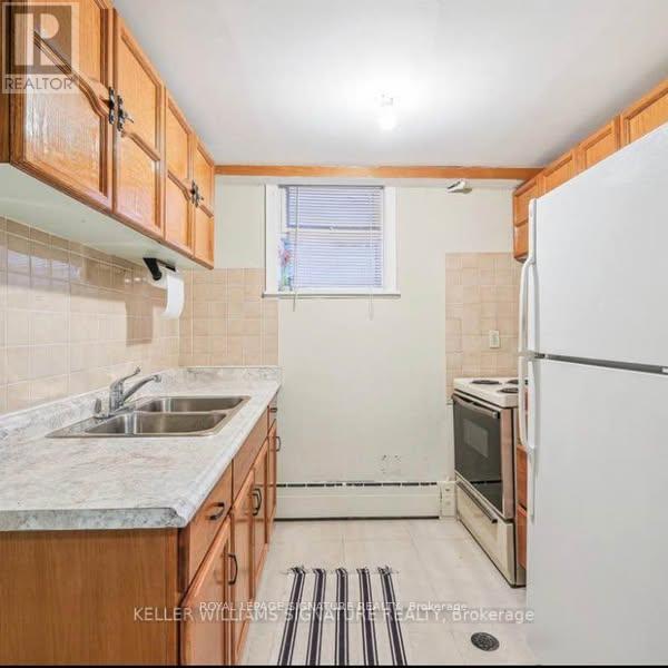 BASEMENT - 214 QUEENSLEA AVENUE, Toronto (Humberlea-Pelmo Park) — photo 6