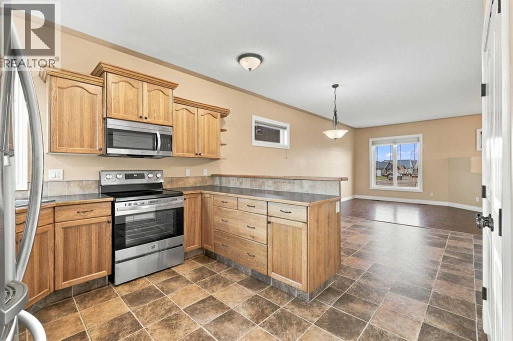 46 Mackenzie Crescent, Lacombe — photo 14