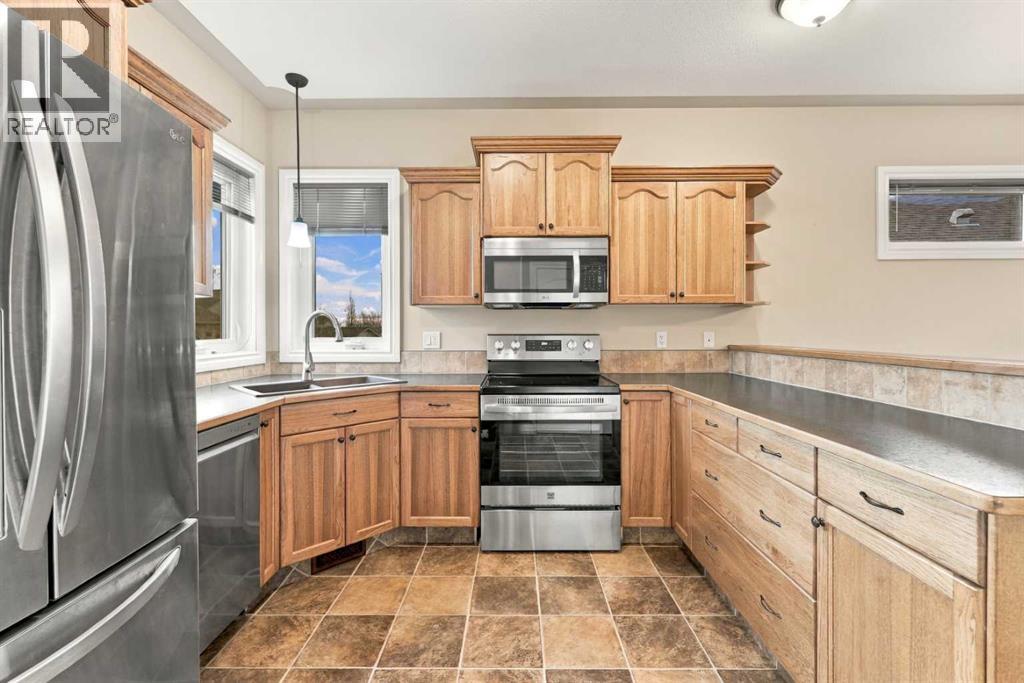 46 Mackenzie Crescent, Lacombe — photo 13