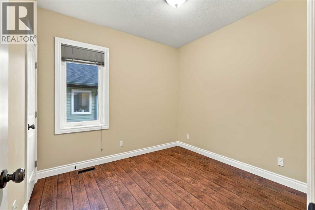 46 Mackenzie Crescent, Lacombe — photo 18