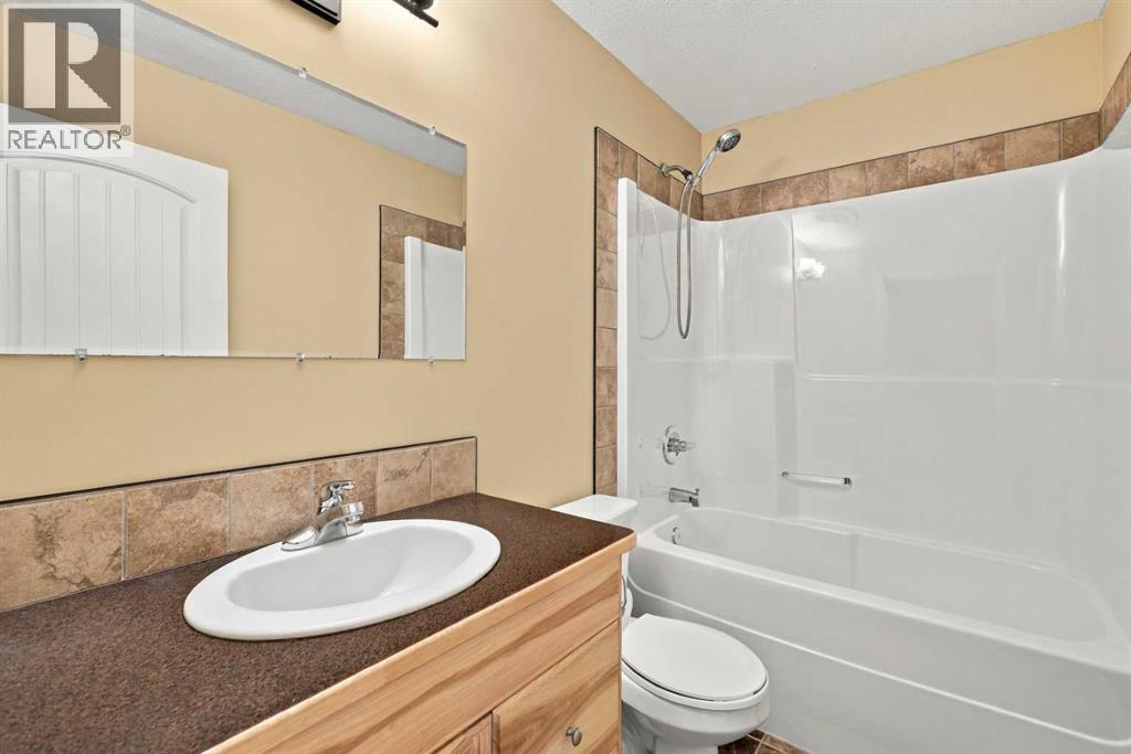 46 Mackenzie Crescent, Lacombe — photo 35