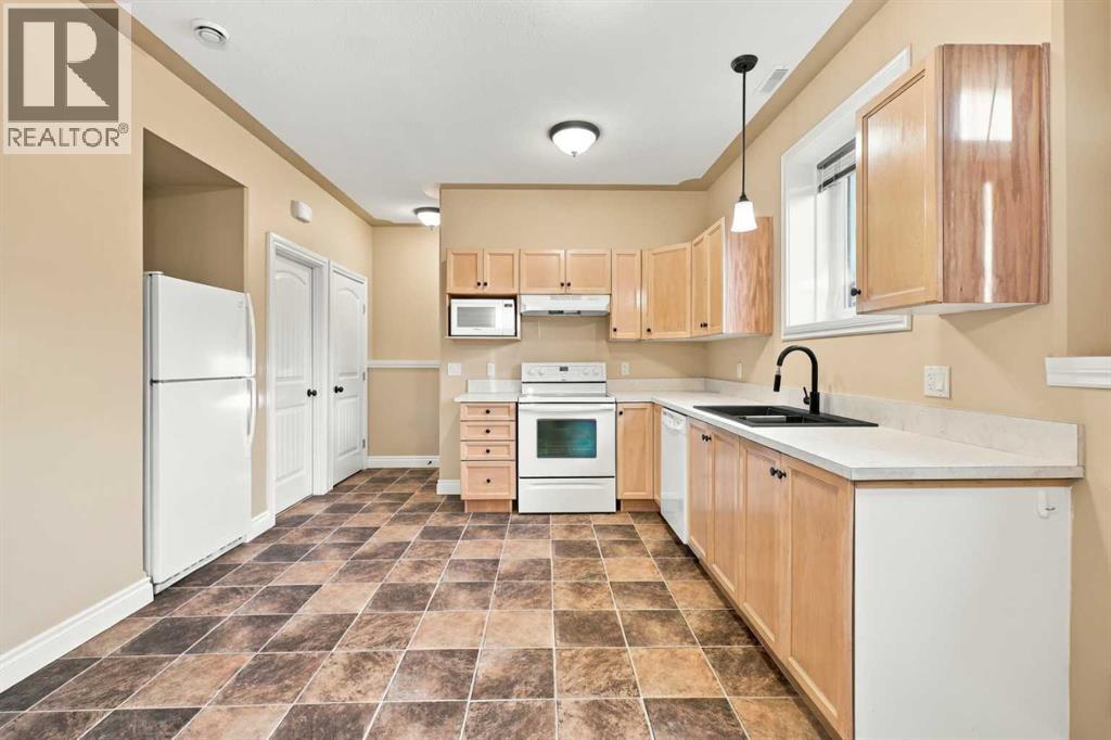 46 Mackenzie Crescent, Lacombe — photo 31