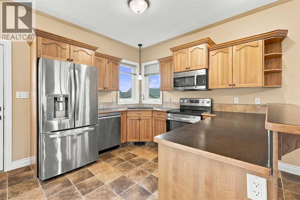 46 Mackenzie Crescent, Lacombe — photo 12