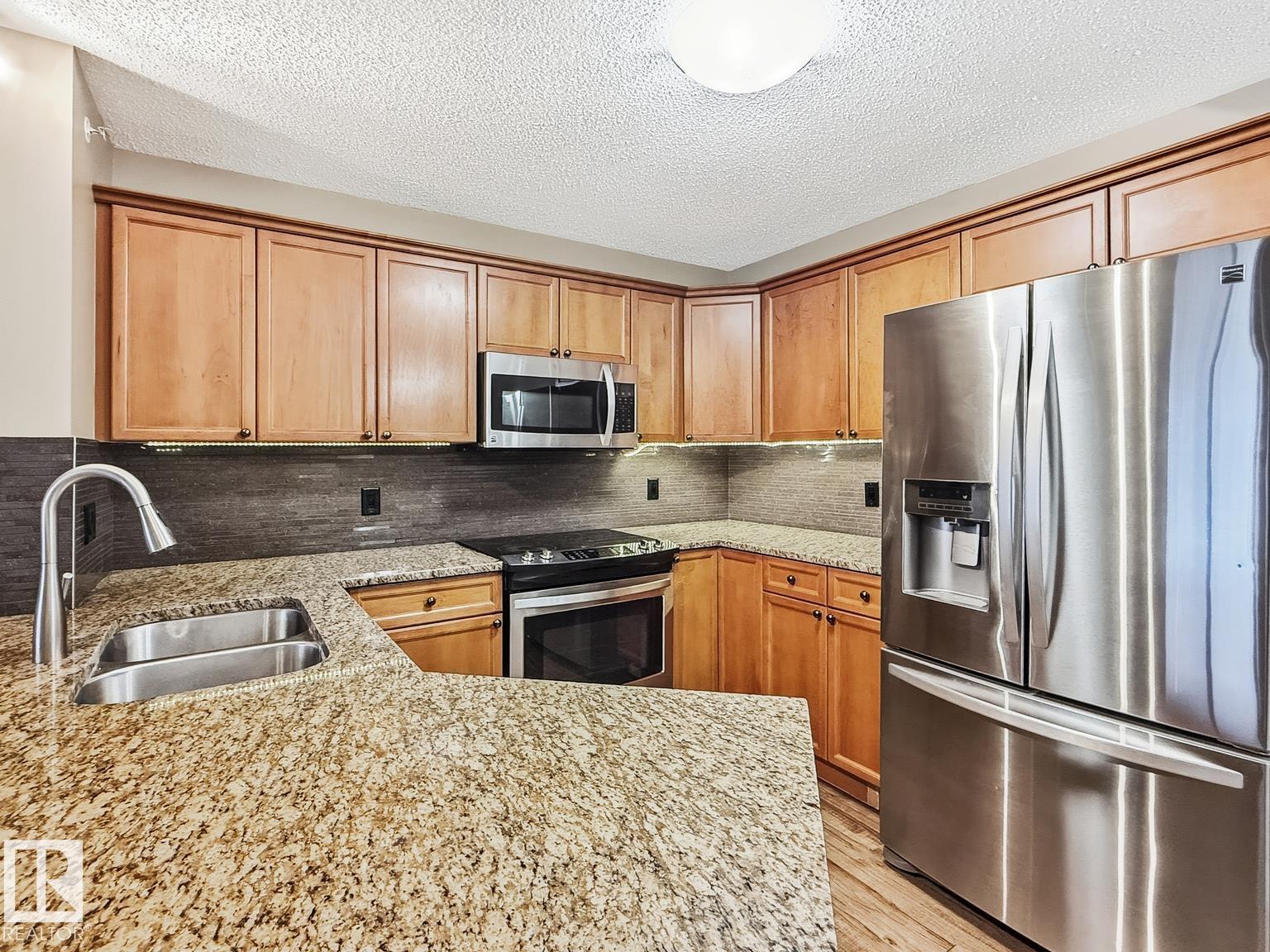 #406 13830 150 AV NW, Edmonton — photo 2