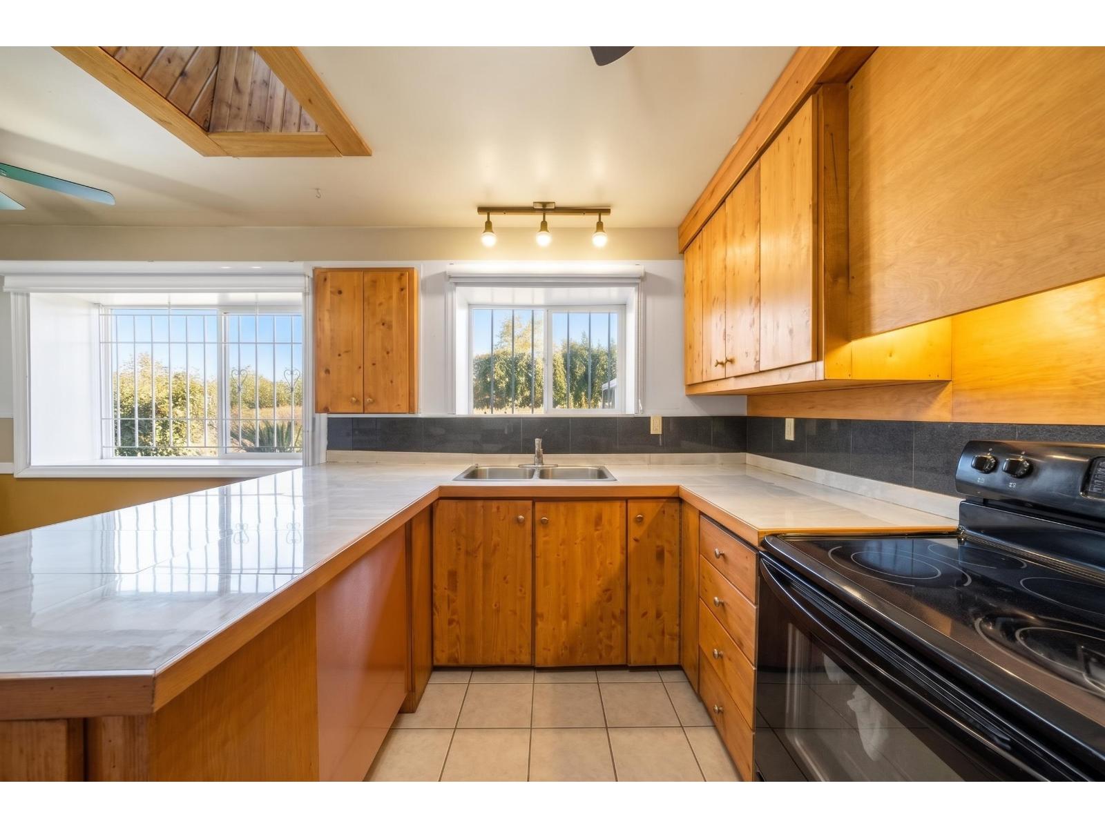3 Bed, 2 Bath House for Sale in Surrey – 12546 96 AVENUE, Surrey – MLS# R3170455 - Image 3