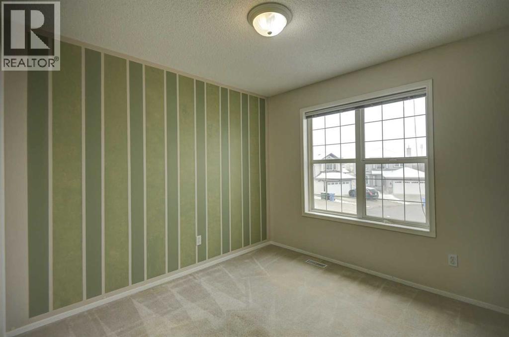 109 Bridlecreek Green SW, Calgary — photo 16