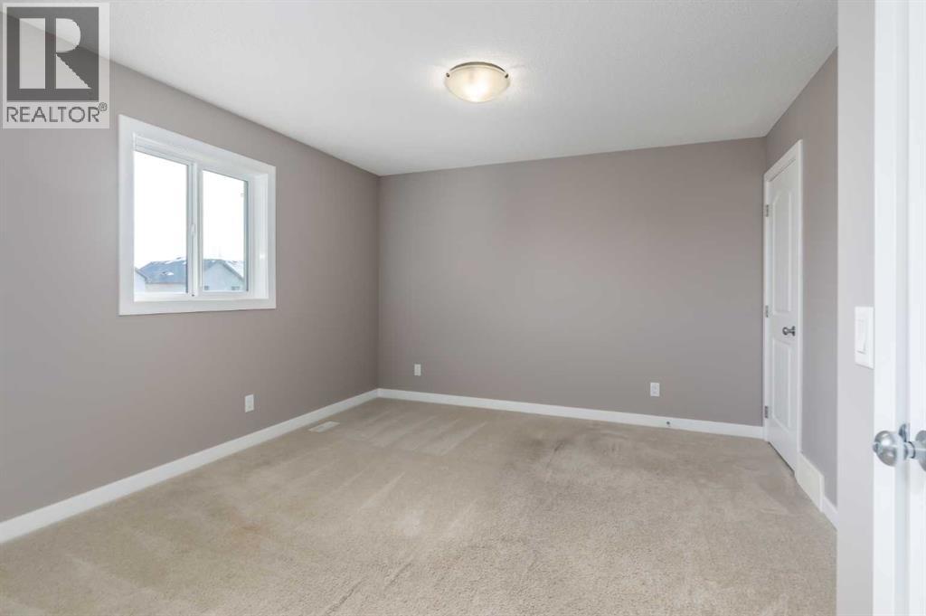 144 CLYDESDALE Way, Cochrane — photo 14