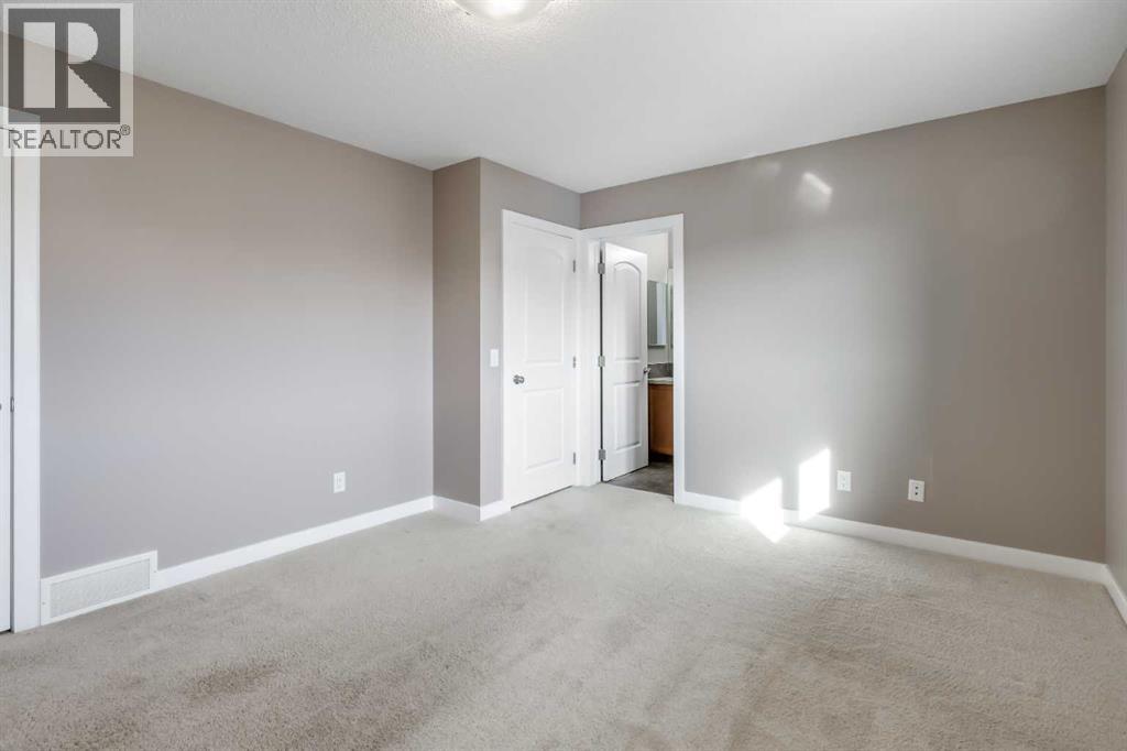 144 CLYDESDALE Way, Cochrane — photo 16